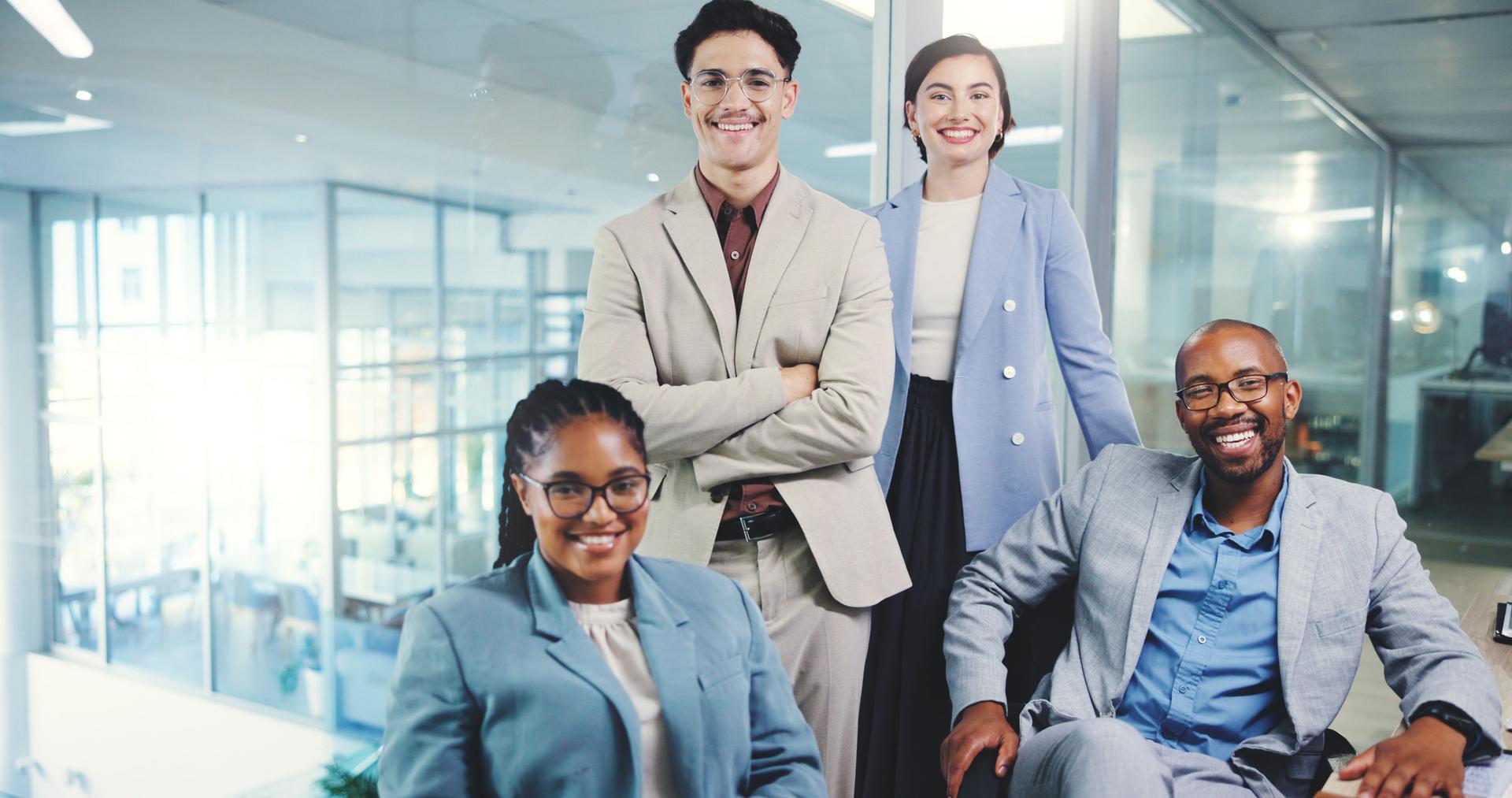 About us, portrait and welcome with business people in office together for friendly introduction. Collaboration, smile and we are hiring with corporate employee team in professional workplace